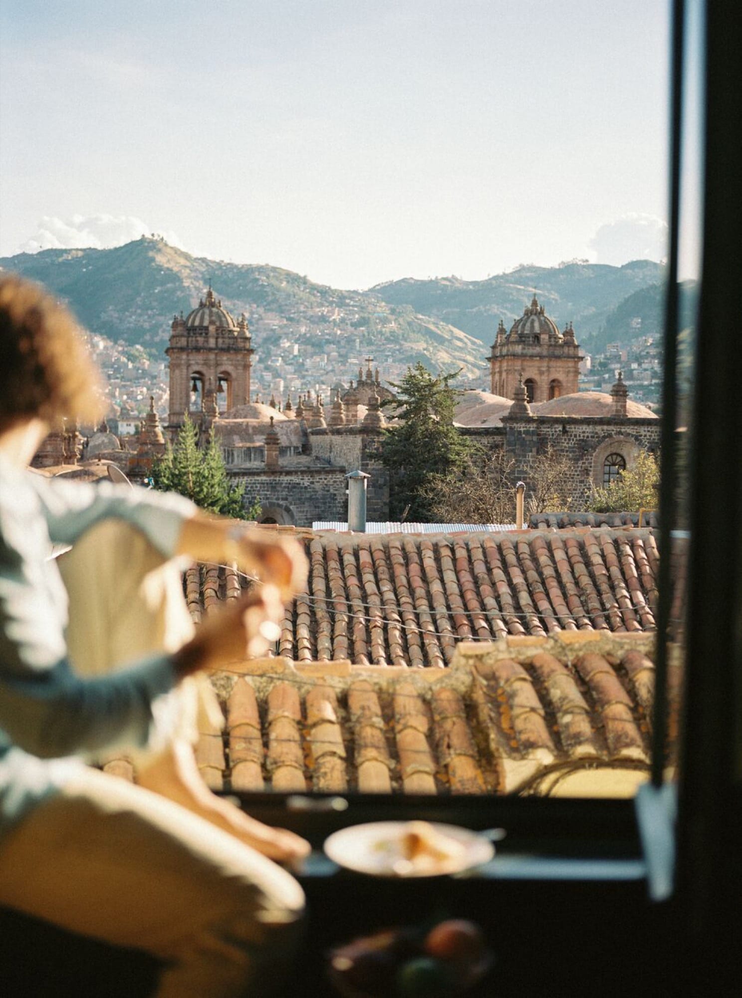 A colonial-era courtyard at a Cusco Belmond property — the Andean light on stone.