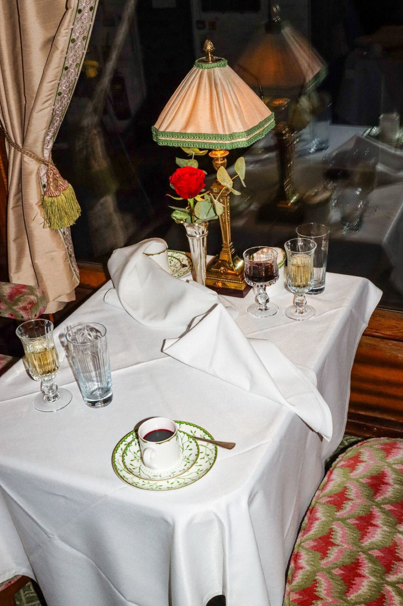 A close-up of vintage marquetry detailing inside a Pullman carriage aboard British Pullman.