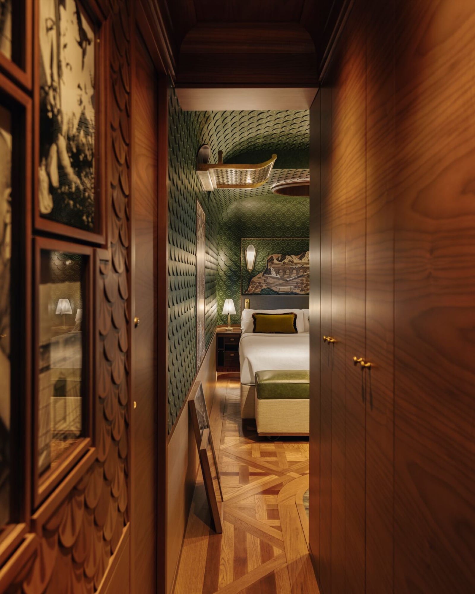 A dining-car interior aboard the Venice Simplon-Orient-Express — original marquetry, Art Deco fixtures, and tables set for an evening service.