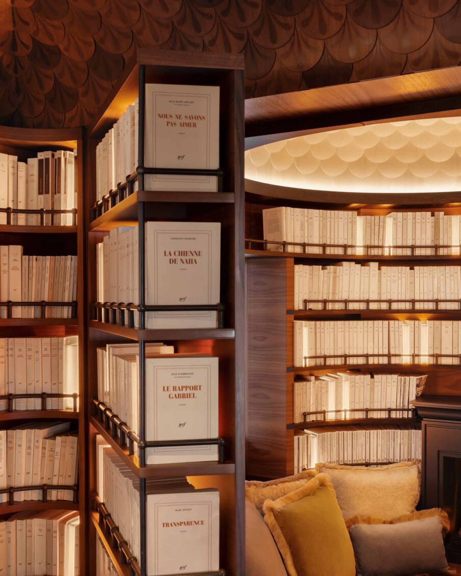 A cabin made up for the night aboard the Venice Simplon-Orient-Express — crisp linens against original marquetry.