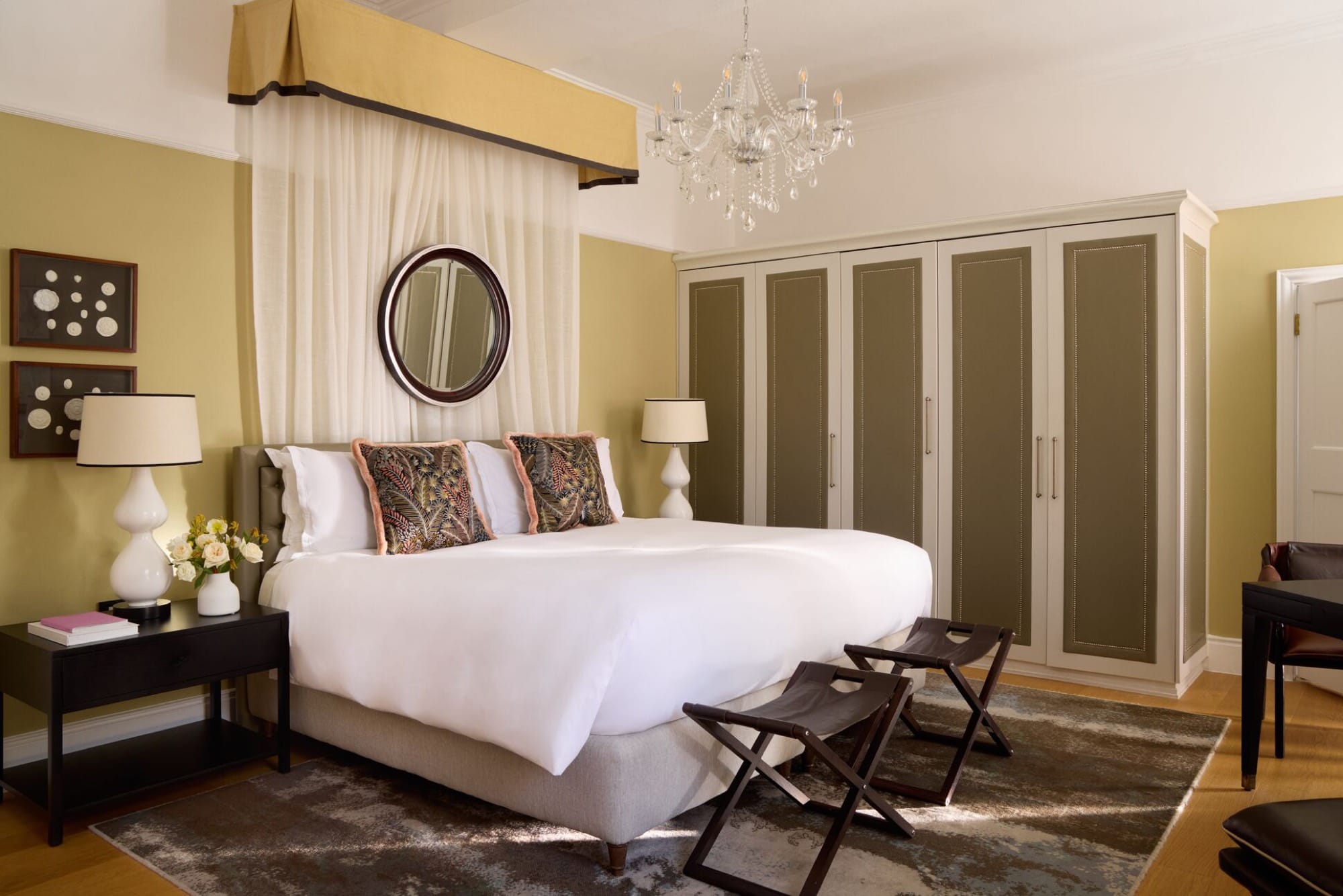 A suite bathroom at Mount Nelson — pale marble, a deep tub, soft natural light.