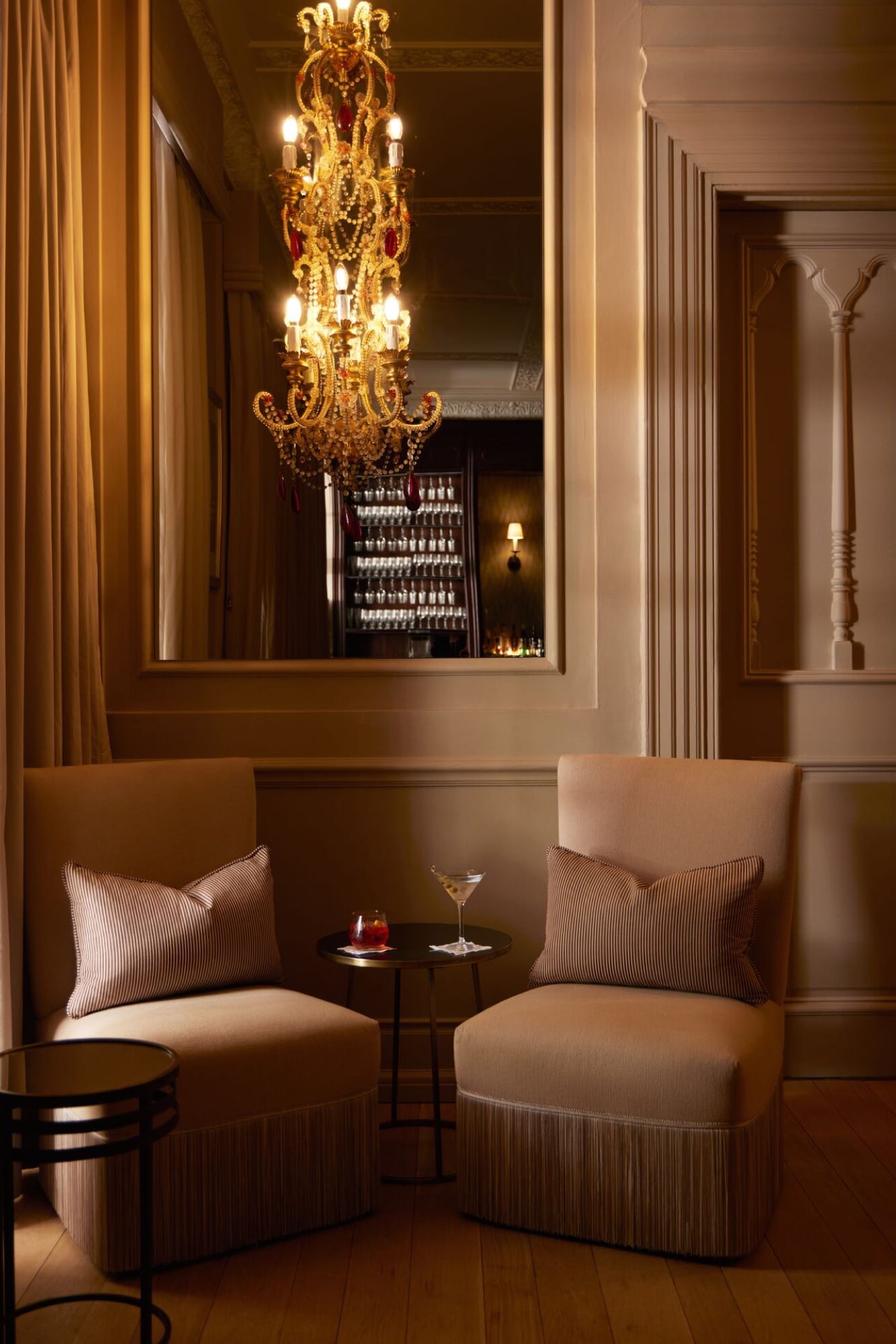 The Planet Bar at Mount Nelson — low light, leather banquettes, a bartender mid-pour.