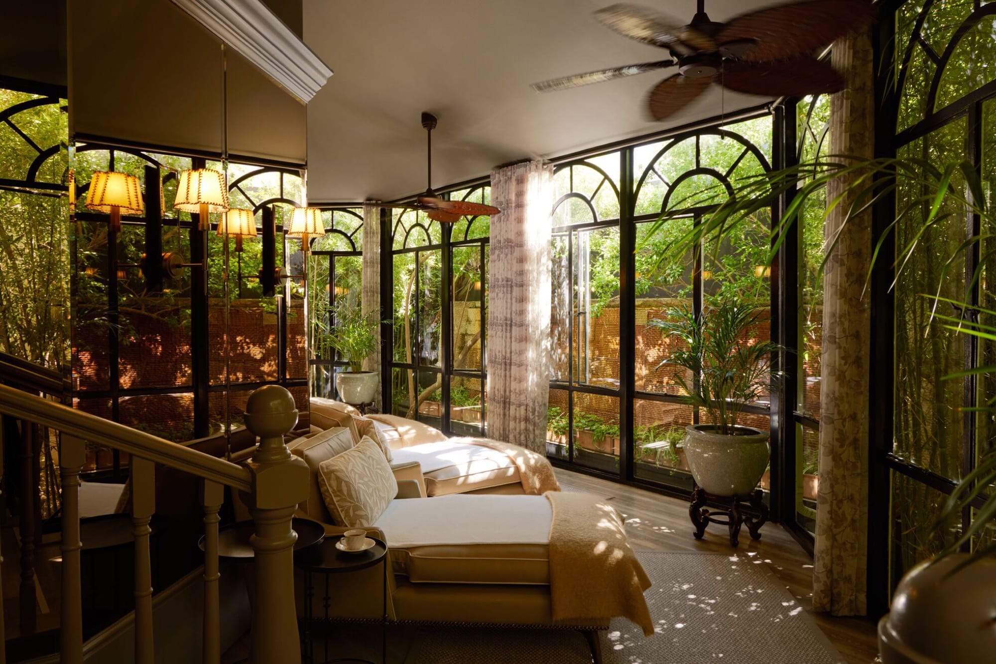 A treatment room at the Librisa Spa, Mount Nelson — soft natural light, pale fabrics, single bed turned down.