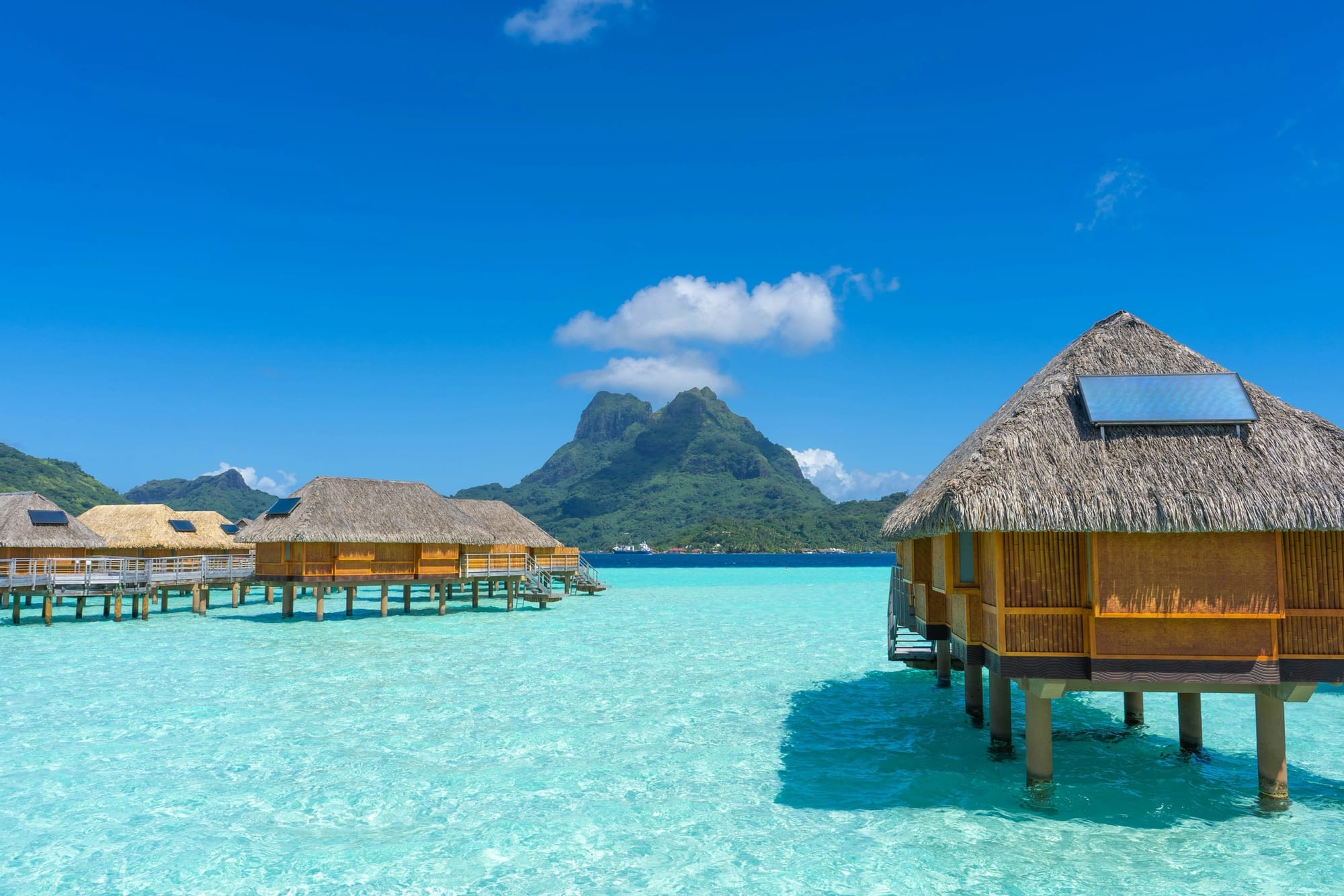 Bora Bora — turquoise lagoon and over-water bungalows, French Polynesia