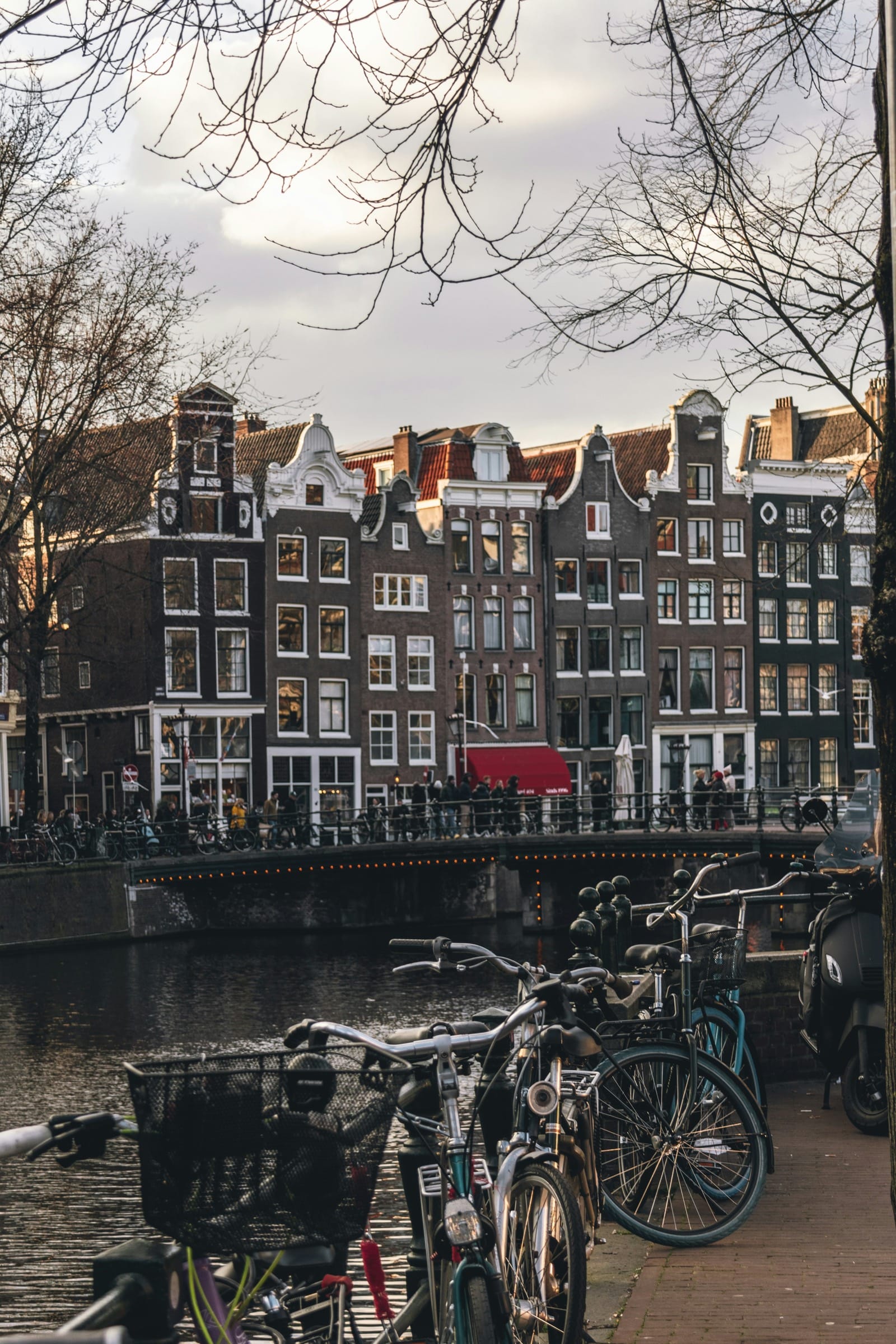Amsterdam canal with historic buildings and bicycles, Netherlands