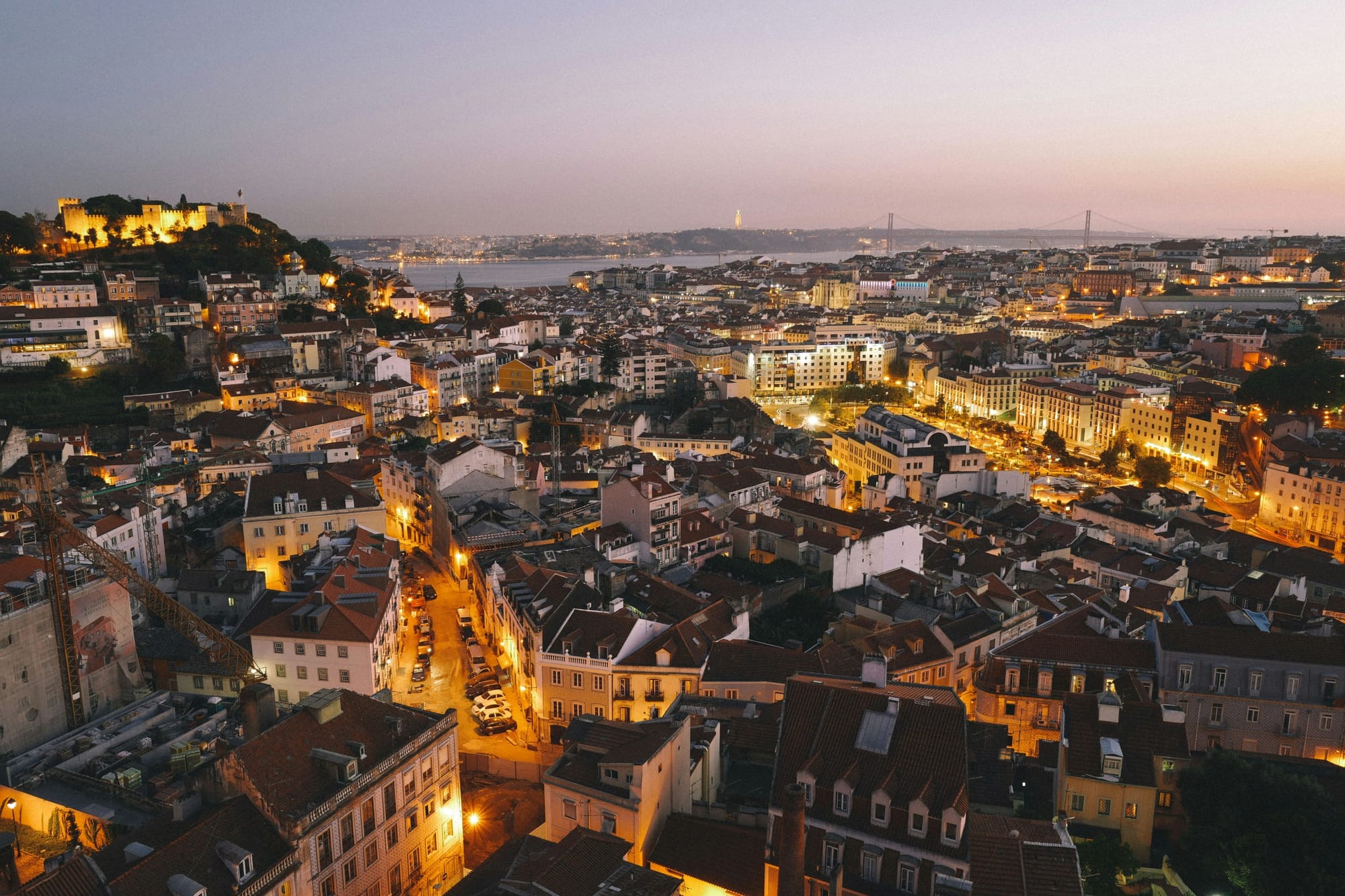 Lisbon hillside rooftops at sunset, Portugal