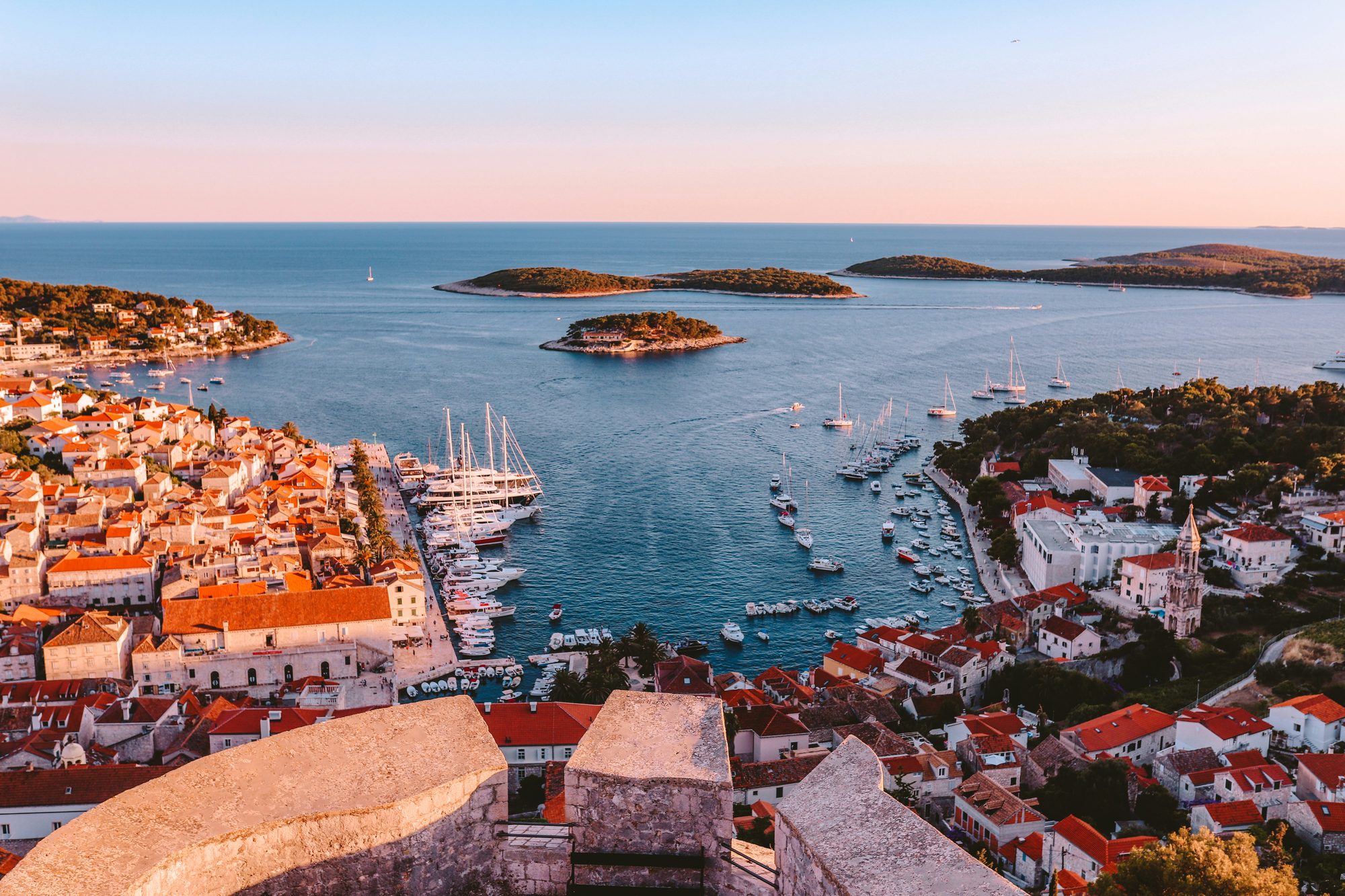 Terracotta-roofed old town above the clear Adriatic on the Dalmatian coast, Croatia.