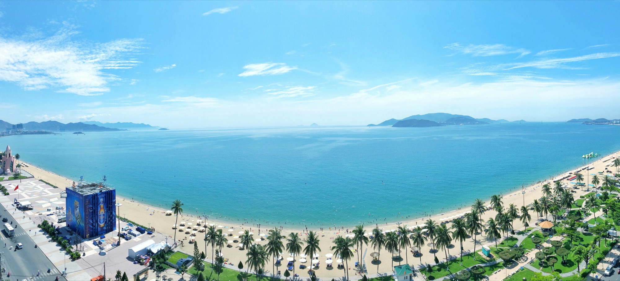 The sweeping turquoise bay and palm-lined beach of the Nha Trang coast, Vietnam