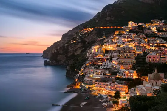 Colorful cliffside villages tumbling down to the blue Mediterranean on the Amalfi Coast