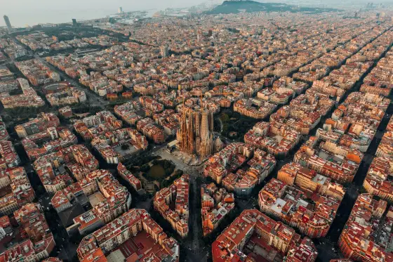 Antoni Gaudi's ornate Sagrada Familia rising above the rooftops of Barcelona