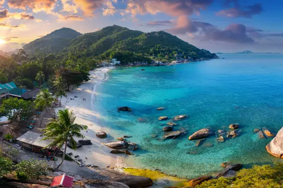 Silver Beach on Koh Samui at sunset, with calm water and palm-lined sand, Thailand