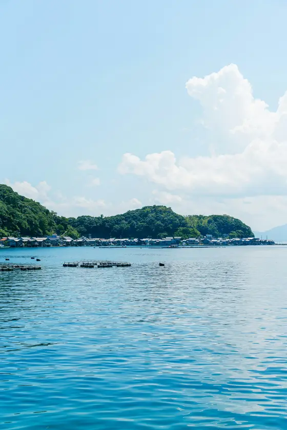 Calm water and pine-covered islands of the Seto Inland Sea, Japan, at golden hour
