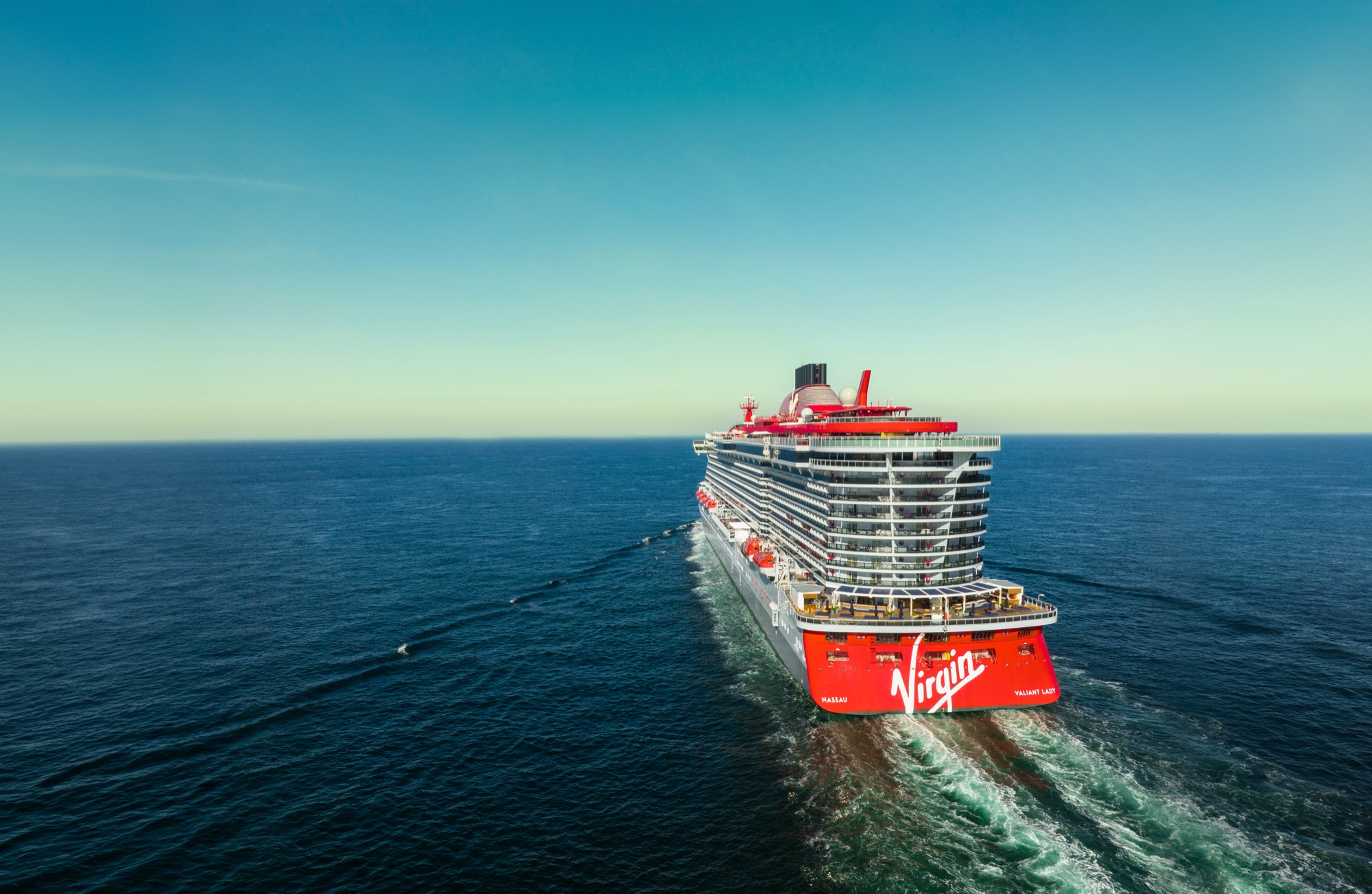 Virgin Voyages' Valiant Lady under way on open ocean.