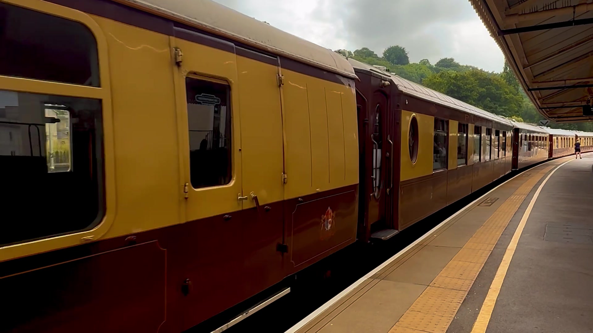 British Pullman, A Belmond Train — the umber-and-cream 1920s carriages at Bath Spa station.